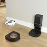 
iRobot-Roomba-s9_-Self-Emptying-Robot-Vacuum-listing-charging-black-white